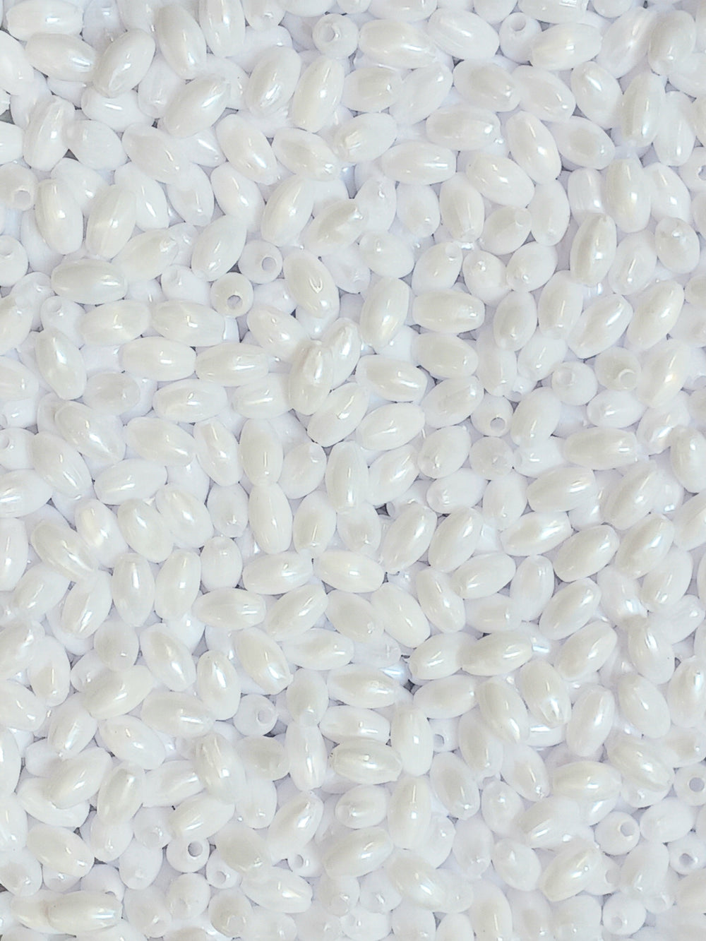 Oval Rice craft beads. DIY Rosary beads