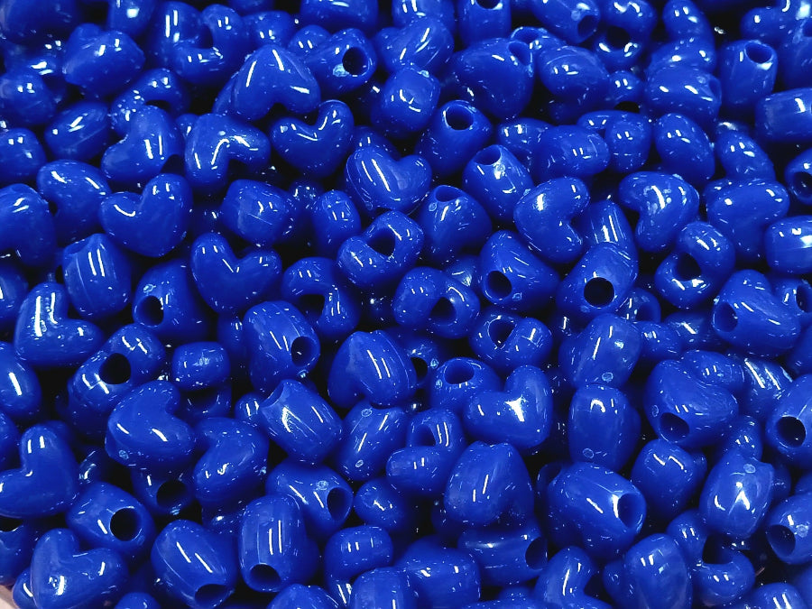 
                  
                    Opaque Royal Blue Heart Shaped Pony Beads with a Vertical Hole. 100 piece, Made in USA.
                  
                