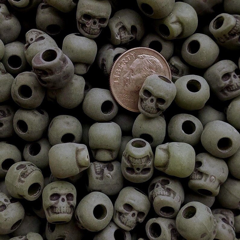 
                  
                    Antiqued Jade Green Skull Beads
                  
                