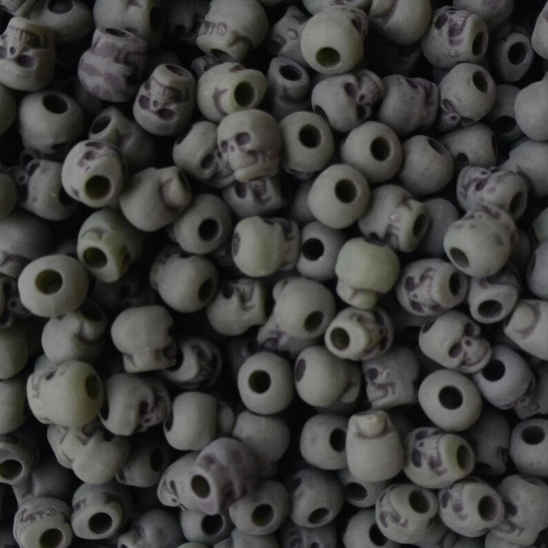 
                  
                    Antiqued Jade Green Skull Beads
                  
                