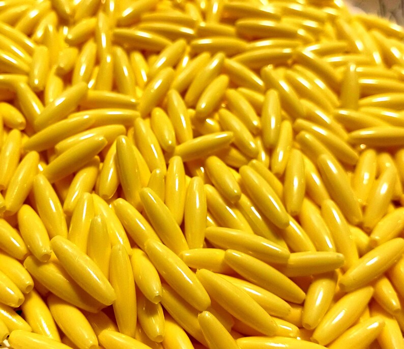 
                  
                    Yellow Spaghetti Beads 19mm Plastic Craft Beads 200pc
                  
                