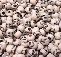 Antiqued Dark Ivory Skull Beads skulls,beads,crafts,head
