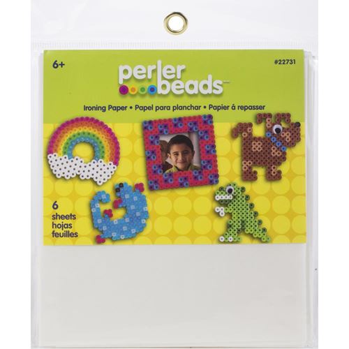 Reusable ironing paper for use with Perler fuse beads and pegboards.
